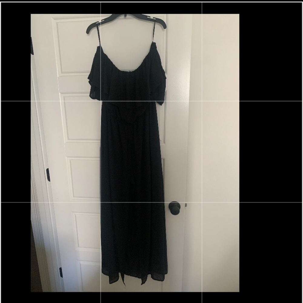 Black off the shoulder maxi length romper.